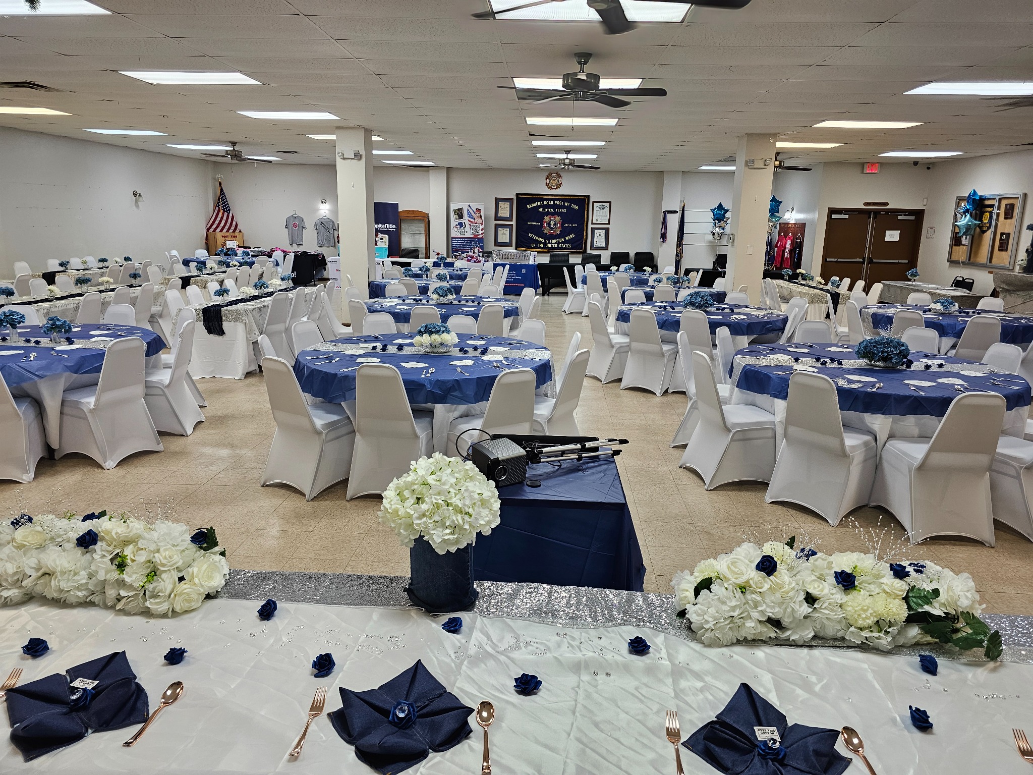VFW Post 7108 hall arranged for a blue and white banquet